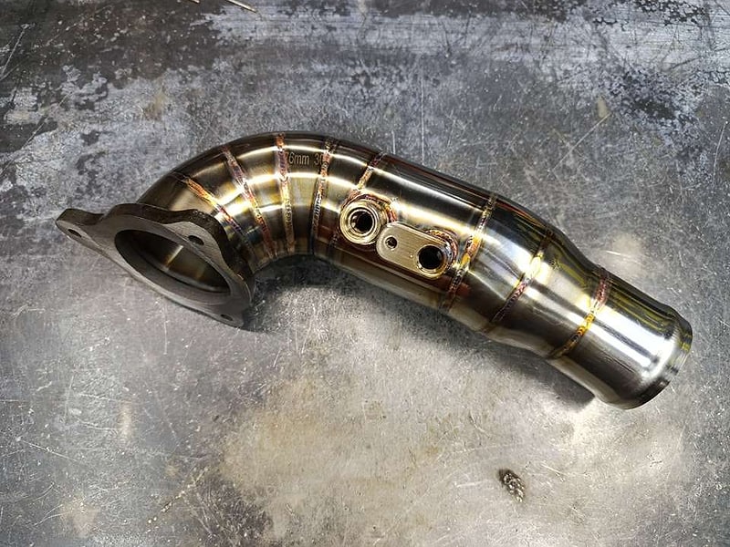 Precision pie-cut stainless downpipe fabricated by SNIPER Racing